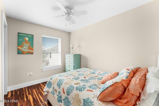 bedroom featuring ceiling fan and wood-type flooring