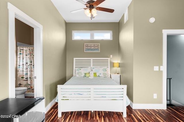 313 Argonaut St, Panama City Beach, FL 32413 - bedroom featuring a ceiling fan, baseboards, and dark wood-style flooring