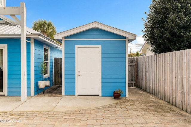 313 Argonaut St, Panama City Beach, FL 32413 - view of shed with a fenced backyard