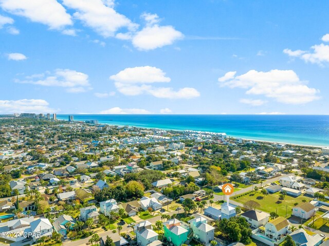 aerial view featuring a water view and a beach view