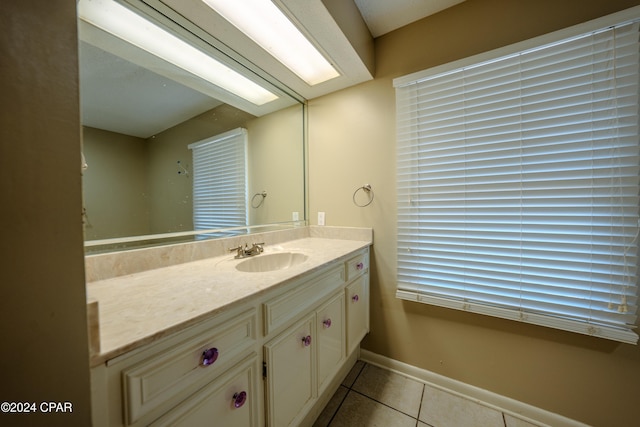 bathroom featuring tile patterned floors and vanity