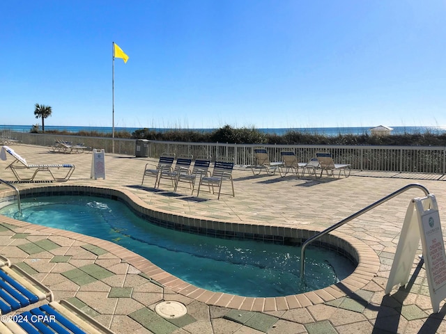 view of pool featuring a patio area