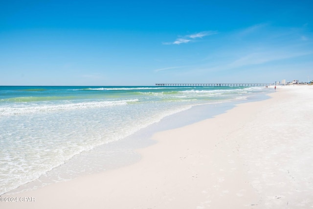 property view of water featuring a beach view