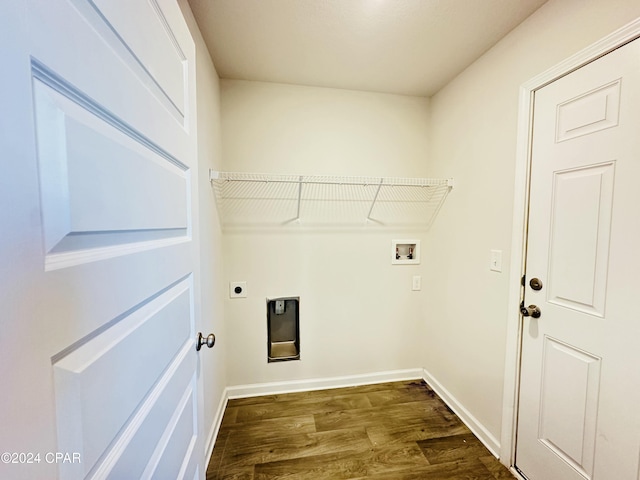 washroom featuring hookup for an electric dryer, washer hookup, and dark wood-type flooring