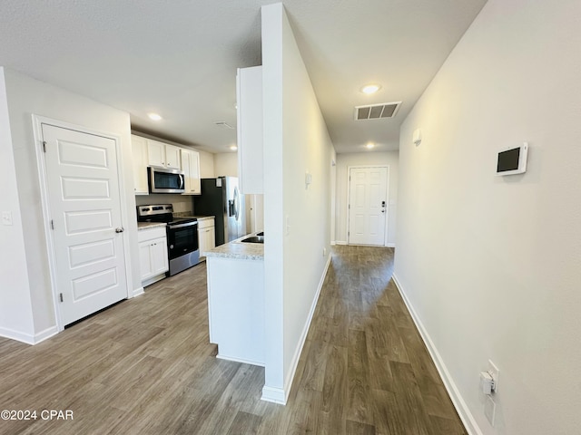 interior space with sink and light hardwood / wood-style floors