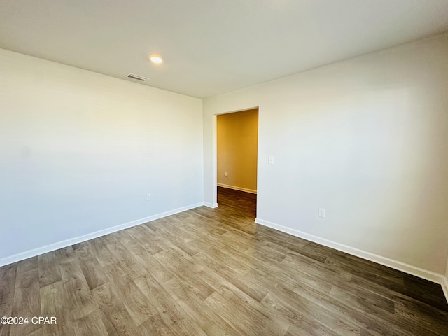 unfurnished room featuring light hardwood / wood-style flooring