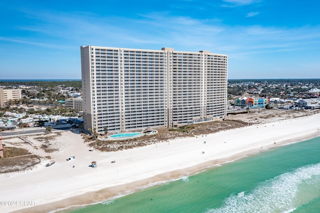 aerial view with a beach view and a water view