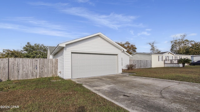 garage with a yard