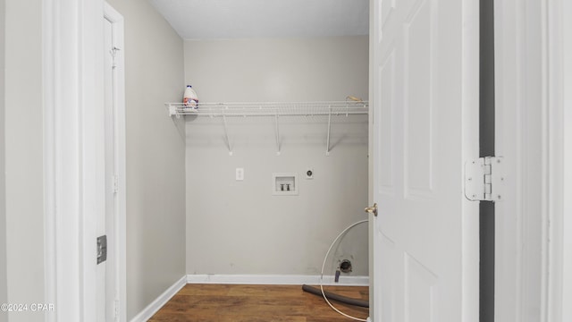 clothes washing area with washer hookup, electric dryer hookup, and hardwood / wood-style floors