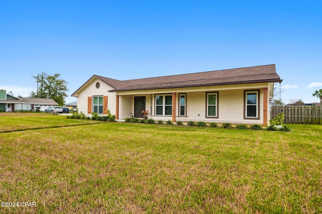 ranch-style home with a front yard