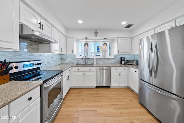 kitchen with white cabinetry, sink, and appliances with stainless steel finishes