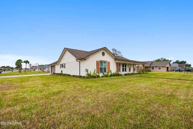 exterior space with a front yard