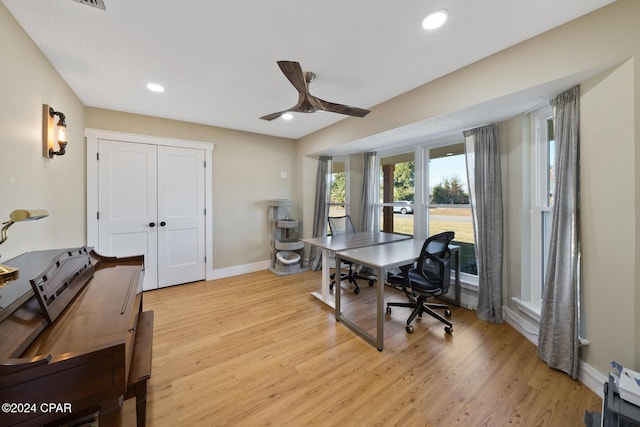 office featuring light hardwood / wood-style floors and ceiling fan