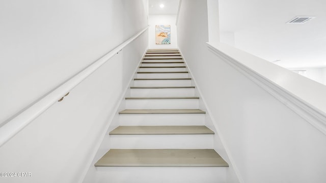 stairs featuring visible vents