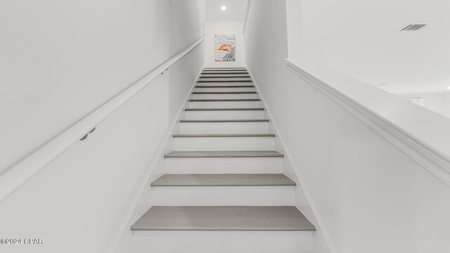 hallway with light wood-type flooring