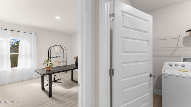 interior space featuring baseboards, recessed lighting, washer / clothes dryer, and light wood-style floors