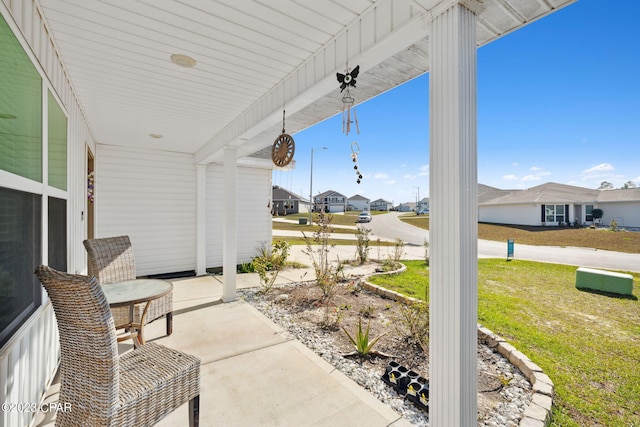 view of patio / terrace with a residential view