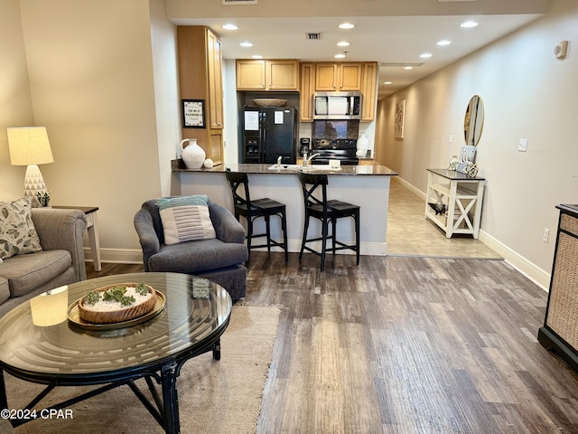 living room featuring wood-type flooring