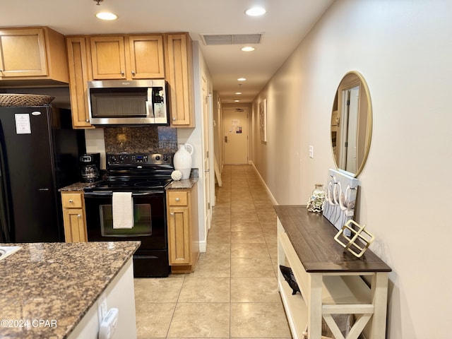 16701 Front Beach Rd Unit 1605, Panama City Beach, FL 32413 - kitchen with black appliances, light tile patterned flooring, recessed lighting, dark stone countertops, and decorative backsplash