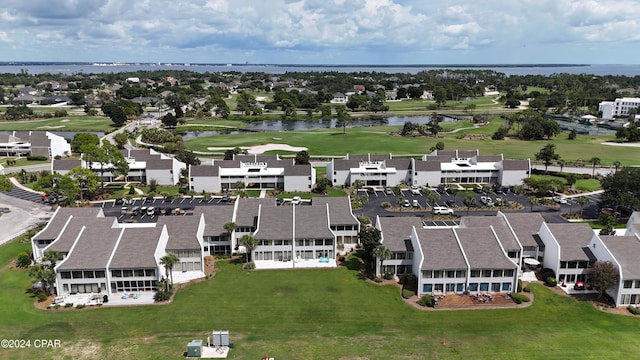 bird's eye view with a water view