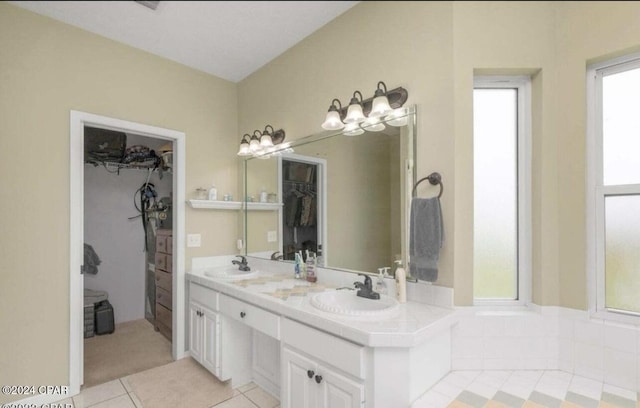 bathroom with vanity and tile patterned flooring