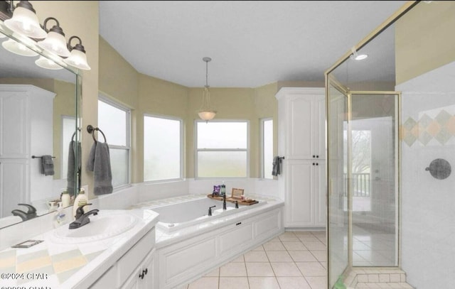 bathroom featuring vanity, separate shower and tub, and tile patterned flooring