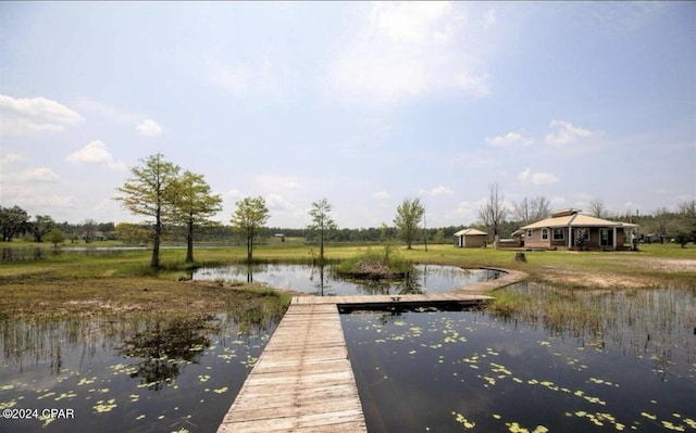 view of dock with a water view