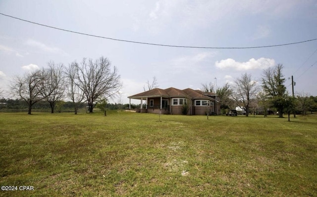 view of front facade with a front lawn