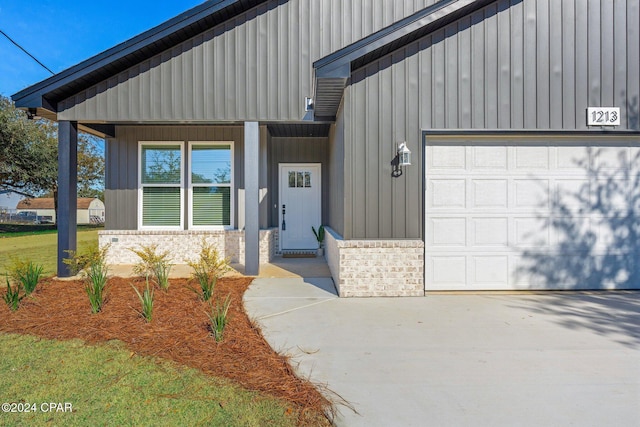 entrance to property featuring a garage