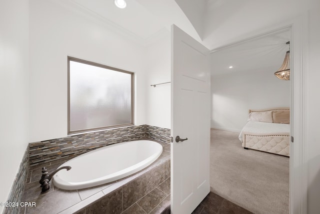 bathroom featuring tiled bath