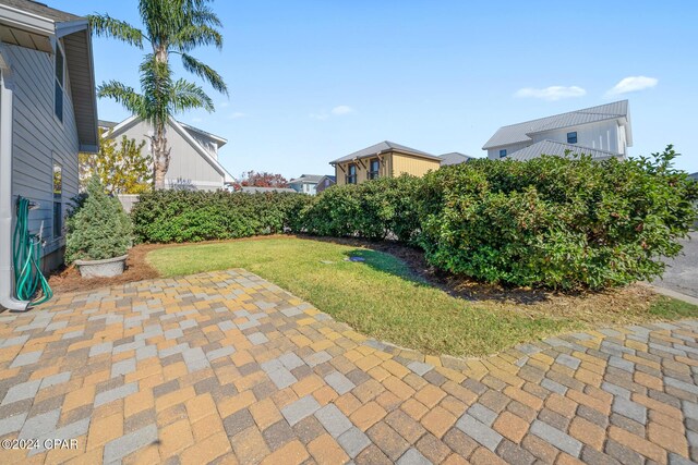 view of yard with a patio area