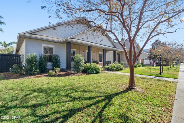 ranch-style house with a front yard