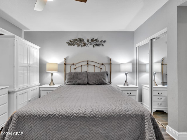 bedroom featuring a ceiling fan and wood finished floors