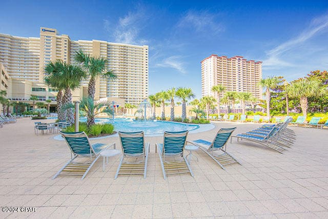 pool with a patio area