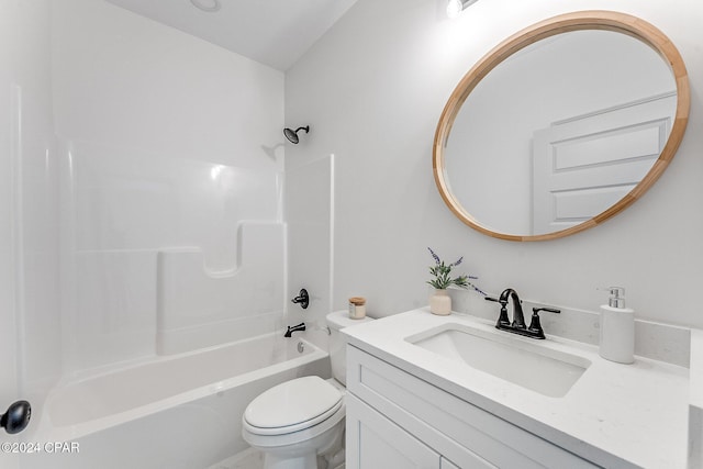 bathroom with toilet, shower / washtub combination, and vanity