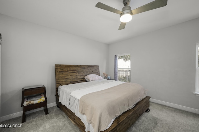 bedroom with ceiling fan and carpet floors