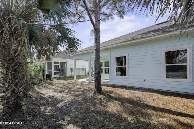 rear view of house with a patio