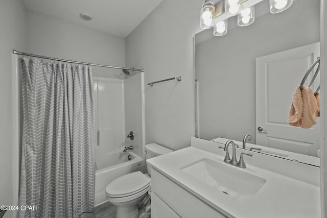 full bathroom featuring shower / bath combination with curtain, toilet, and vanity