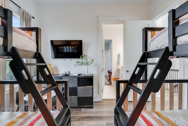 stairs with hardwood / wood-style floors