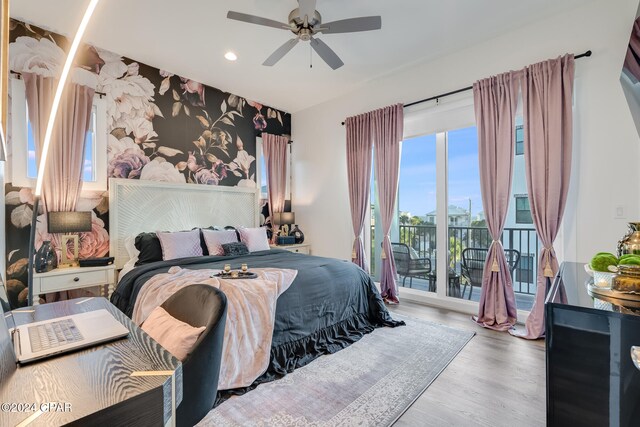 bedroom with access to outside, ceiling fan, and light wood-type flooring