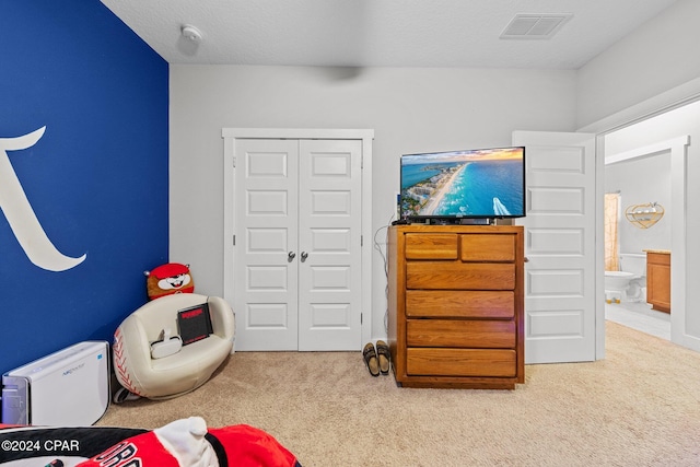 rec room featuring light colored carpet