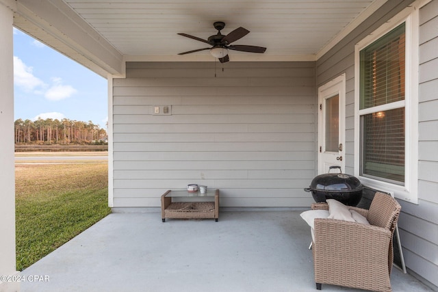 view of patio / terrace featuring ceiling fan