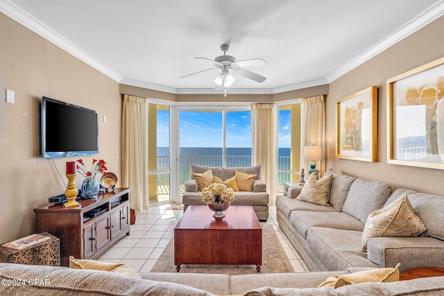 living room featuring ceiling fan, light tile patterned floors, crown molding, and a wealth of natural light