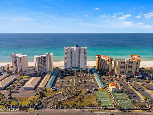 drone / aerial view featuring a view of the beach and a water view