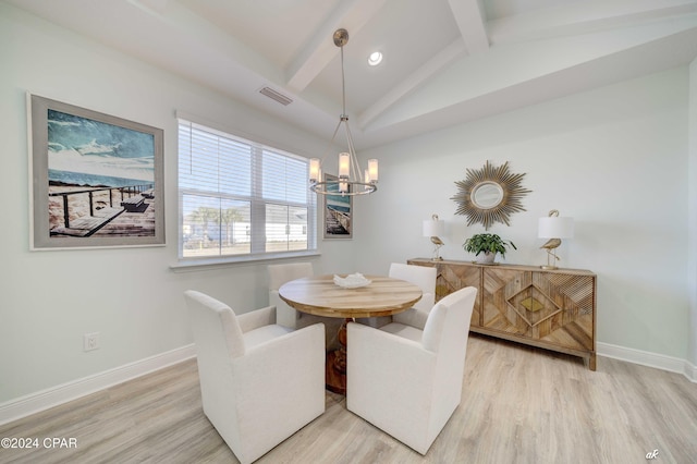 dining space with a chandelier, vaulted ceiling with beams, and hardwood / wood-style flooring