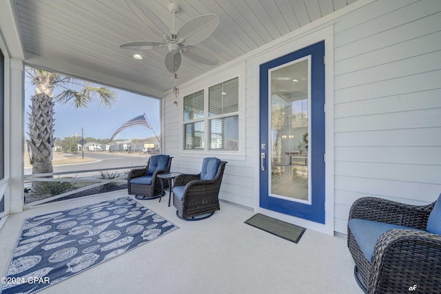 exterior space with ceiling fan, plenty of natural light, and wood ceiling