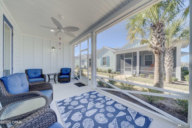 sunroom / solarium with ceiling fan