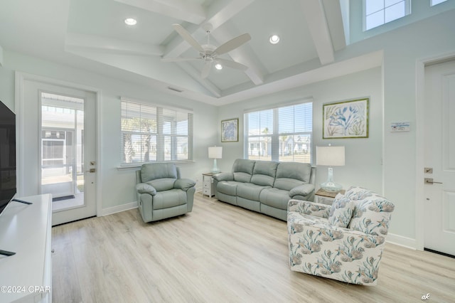 living room featuring ceiling fan, a healthy amount of sunlight, and light hardwood / wood-style floors