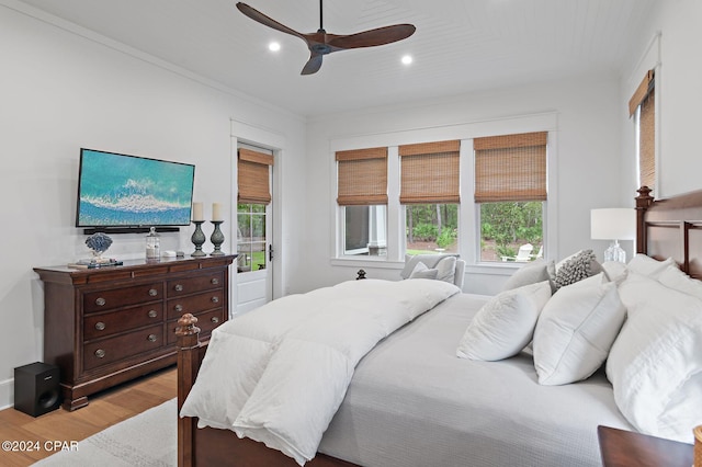 bedroom featuring ceiling fan and light wood-type flooring