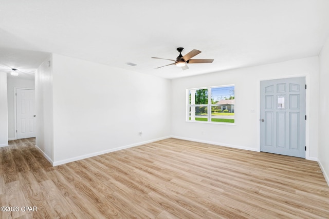 unfurnished living room with ceiling fan and light hardwood / wood-style floors